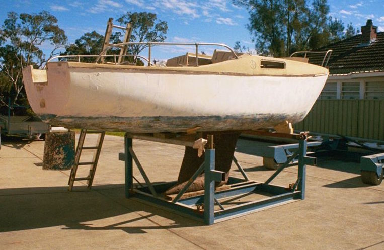 boat on hard stand before painting and repairs 01